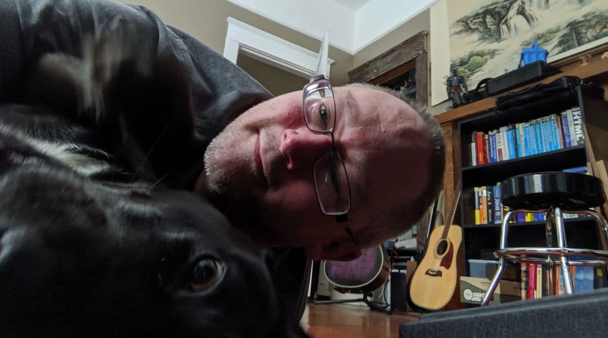 Photo of mjac and his dog Clipper who always hams it up for a camera